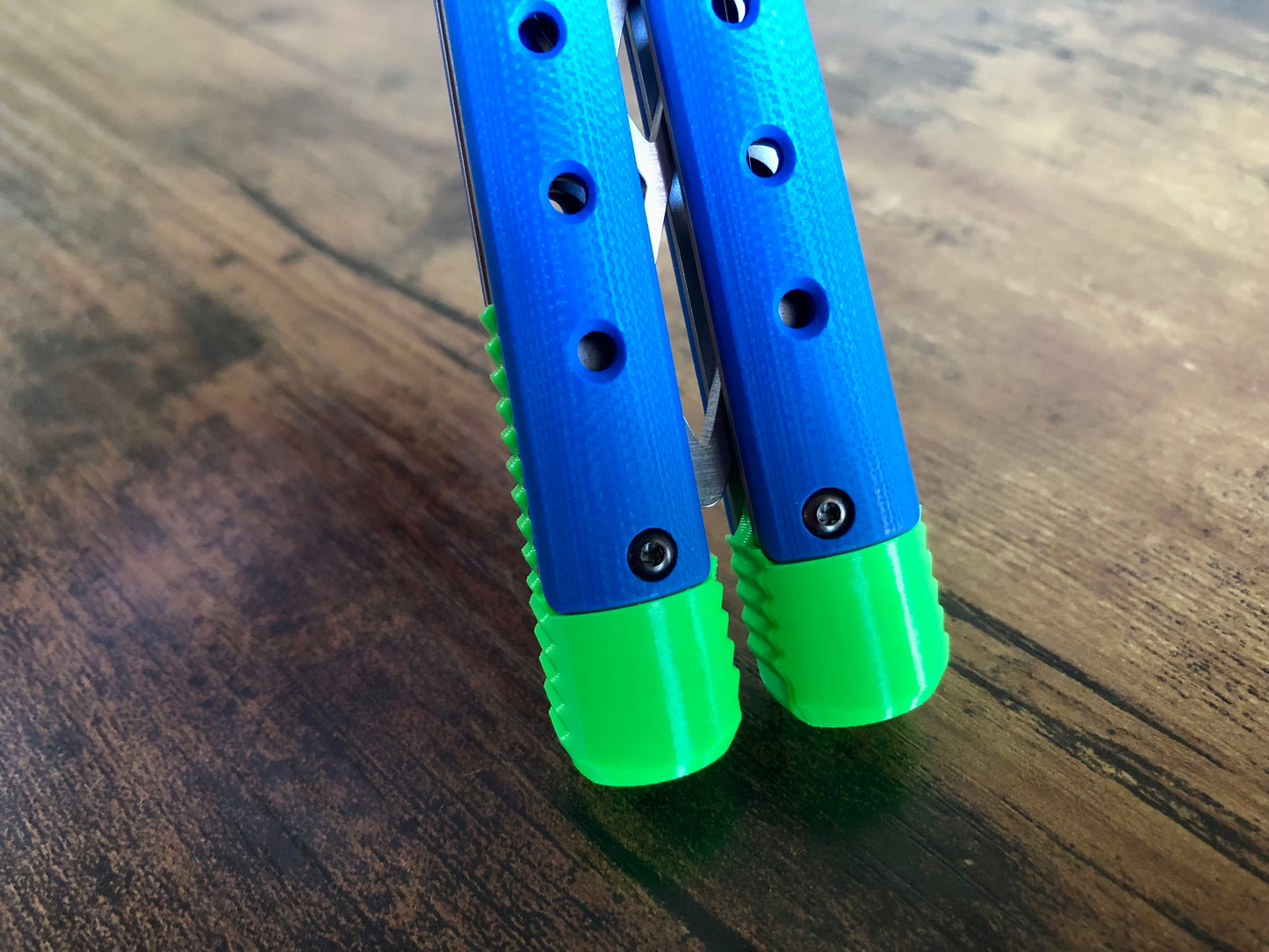 These Zippy spacers for the Benchmade Necron balisong are shatter-proof extensions that will protect your handles with no risk of cracking on hard-drops. They are available in 3x different lengths with removable tungsten weights for a more granular balance and length customization. They also offer positive jimping for extra grip, and install easily in just a few minutes (watch the assembly video above!). These spacers are a no-nonsense upgrade for the Necron.