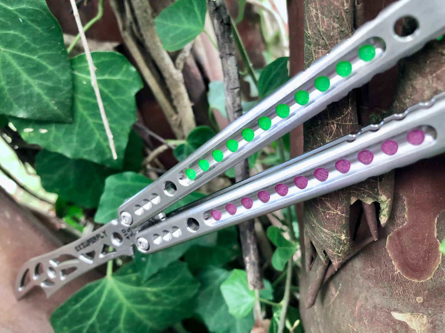 Add a pop of color to your BBbarfly SuperFly balisong trainer with these polyurethane Zippy handle inlays.