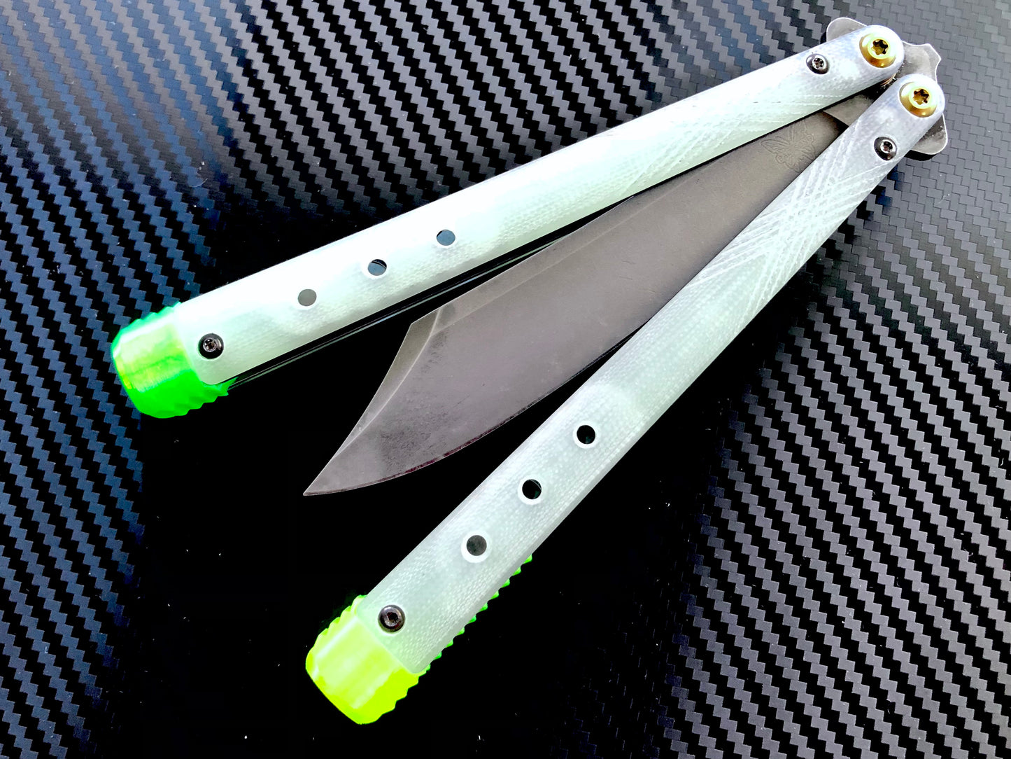 These Zippy spacers for the Benchmade Necron balisong are shatter-proof extensions that will protect your handles with no risk of cracking on hard-drops. They are available in 3x different lengths with removable tungsten weights for a more granular balance and length customization. They also offer positive jimping for extra grip, and install easily in just a few minutes (watch the assembly video above!). These spacers are a no-nonsense upgrade for the Necron.