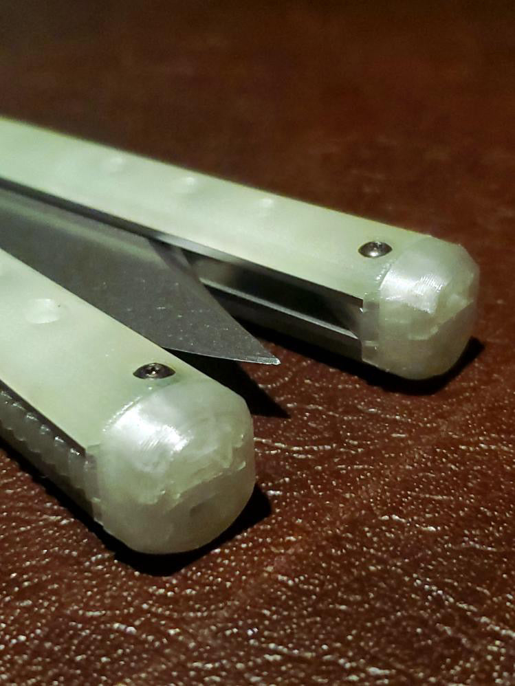These Zippy spacers for the Benchmade Necron balisong are shatter-proof extensions that will protect your handles with no risk of cracking on hard-drops. They are available in 3x different lengths with removable tungsten weights for a more granular balance and length customization. They also offer positive jimping for extra grip, and install easily in just a few minutes (watch the assembly video above!). These spacers are a no-nonsense upgrade for the Necron.