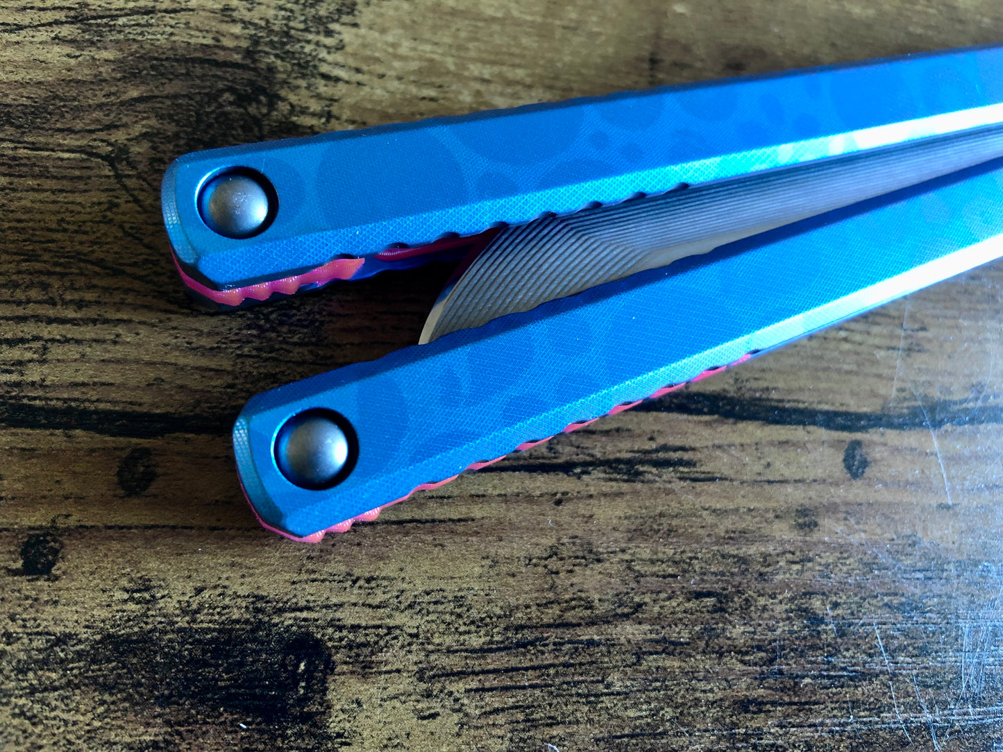 These Zippy spacers designed for the Fellowship Blades Gaboon balisong are made in-house from a rubbery, shatter-proof polyurethane. They add additional jimping to the Gaboon, and are also available as extensions which add handle length, protect the handles from drops, and include an adjustable tungsten weight system.
