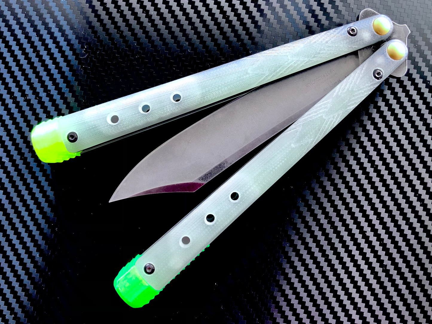 These Zippy spacers for the Benchmade Necron balisong are shatter-proof extensions that will protect your handles with no risk of cracking on hard-drops. They are available in 3x different lengths with removable tungsten weights for a more granular balance and length customization. They also offer positive jimping for extra grip, and install easily in just a few minutes (watch the assembly video above!). These spacers are a no-nonsense upgrade for the Necron.