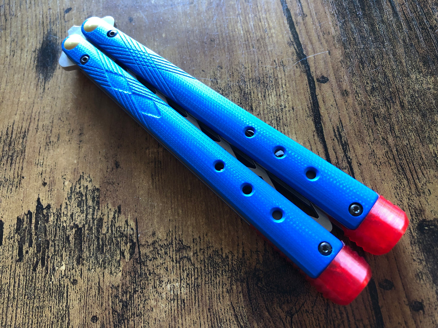 These Zippy spacers for the Benchmade Necron balisong are shatter-proof extensions that will protect your handles with no risk of cracking on hard-drops. They are available in 3x different lengths with removable tungsten weights for a more granular balance and length customization. They also offer positive jimping for extra grip, and install easily in just a few minutes (watch the assembly video above!). These spacers are a no-nonsense upgrade for the Necron.