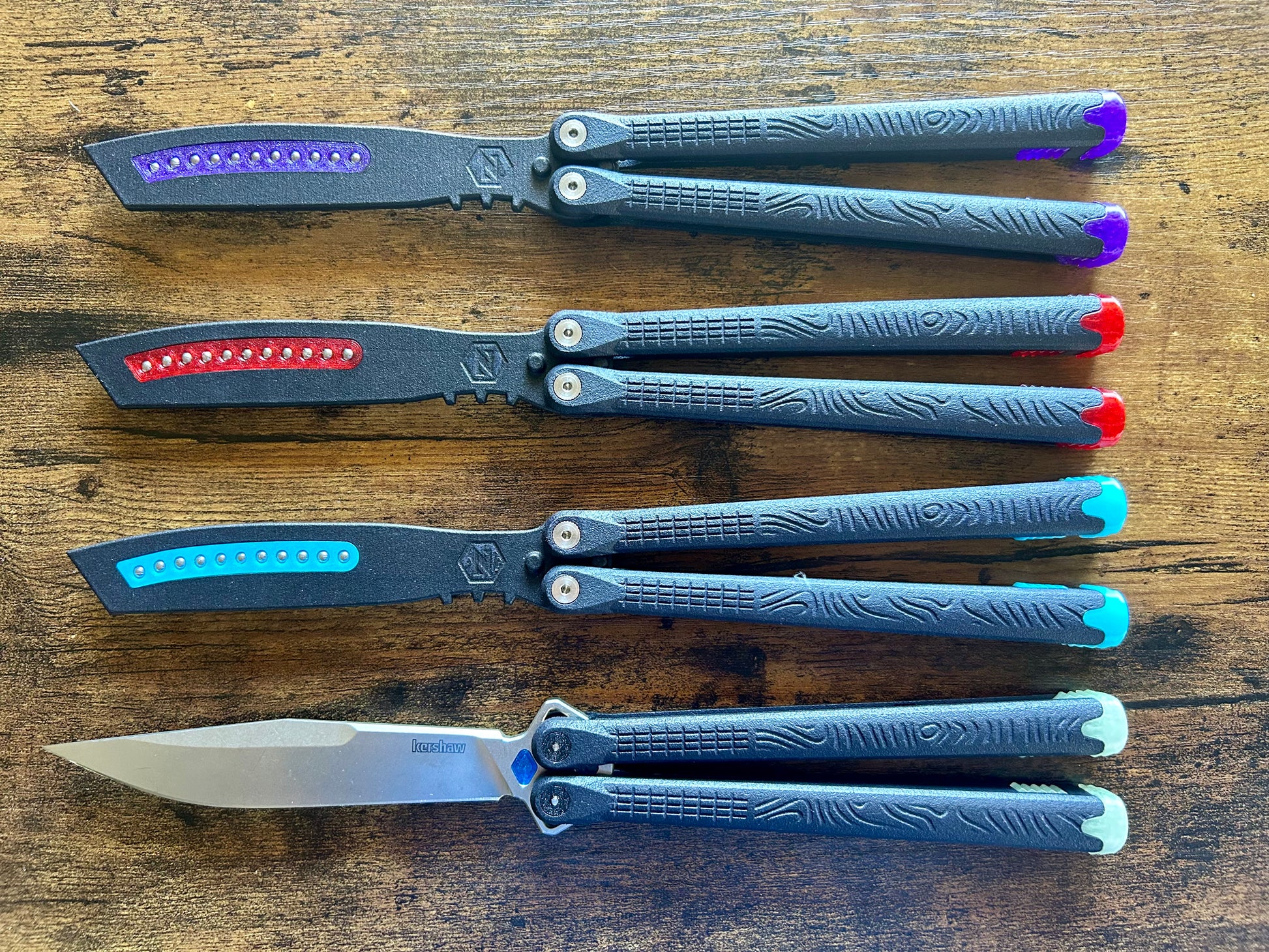 ZippyLucha handles (aka ZLucha) are a set of aftermarket handles for the Kershaw Lucha Balisong (live blade). They lighten the Lucha (3.62 oz), improve the balance for flipping, and introduce the high-performance threadlocker-free Zippy pivot/bearing system.