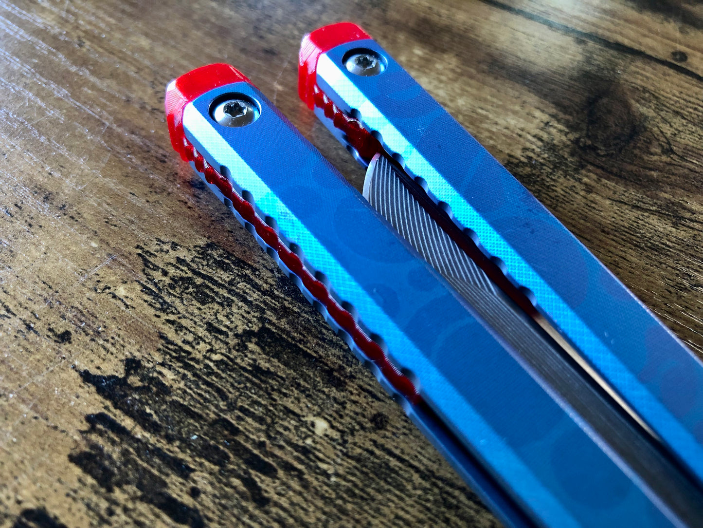 These Zippy spacers designed for the Fellowship Blades Gaboon balisong are made in-house from a rubbery, shatter-proof polyurethane. They add additional jimping to the Gaboon, and are also available as extensions which add handle length, protect the handles from drops, and include an adjustable tungsten weight system.