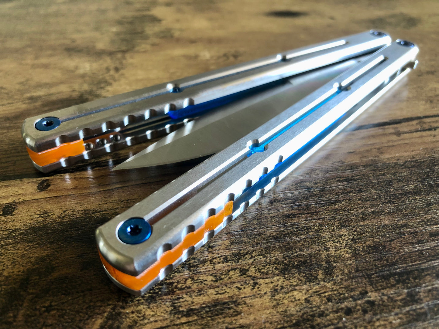 These Zippy spacers are designed for the Squid Industries Titanium Krake Raken and provide a "block spacer" aesthetic. The spacers feature an innovative "segmented" geometry, allowing full integration with the stock weight-pin system and endless balance and ergo configurations to fine-tune the weight distribution to your preference. The Zippy spacers also remedy the stock slab offset (i.e., spacer thickness) of the Ti Krake to establish improved handle parallelism for the best tune possible.