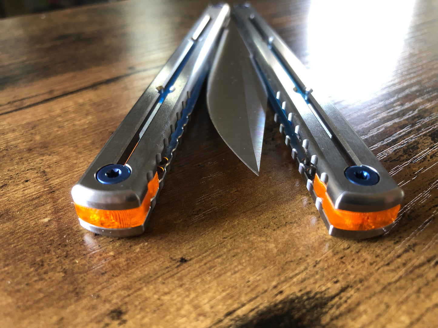 These Zippy spacers are designed for the Squid Industries Titanium Krake Raken and provide a "block spacer" aesthetic. The spacers feature an innovative "segmented" geometry, allowing full integration with the stock weight-pin system and endless balance and ergo configurations to fine-tune the weight distribution to your preference. The Zippy spacers also remedy the stock slab offset (i.e., spacer thickness) of the Ti Krake to establish improved handle parallelism for the best tune possible.