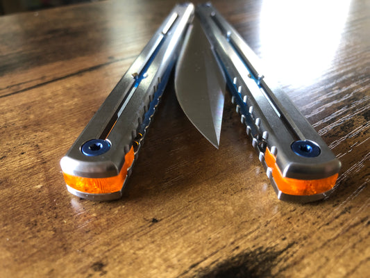 These Zippy spacers are designed for the Squid Industries Titanium Krake Raken and provide a "block spacer" aesthetic. The spacers feature an innovative "segmented" geometry, allowing full integration with the stock weight-pin system and endless balance and ergo configurations to fine-tune the weight distribution to your preference. The Zippy spacers also remedy the stock slab offset (i.e., spacer thickness) of the Ti Krake to establish improved handle parallelism for the best tune possible.
