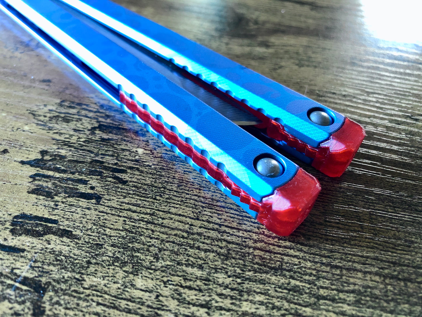 These Zippy spacers designed for the Fellowship Blades Gaboon balisong are made in-house from a rubbery, shatter-proof polyurethane. They add additional jimping to the Gaboon, and are also available as extensions which add handle length, protect the handles from drops, and include an adjustable tungsten weight system.