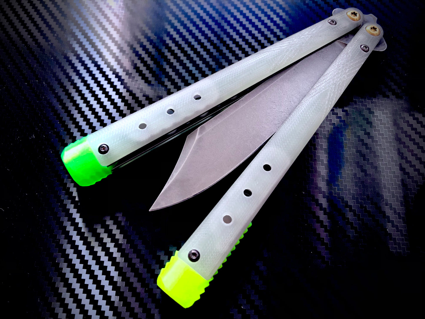 These Zippy spacers for the Benchmade Necron balisong are shatter-proof extensions that will protect your handles with no risk of cracking on hard-drops. They are available in 3x different lengths with removable tungsten weights for a more granular balance and length customization. They also offer positive jimping for extra grip, and install easily in just a few minutes (watch the assembly video above!). These spacers are a no-nonsense upgrade for the Necron.