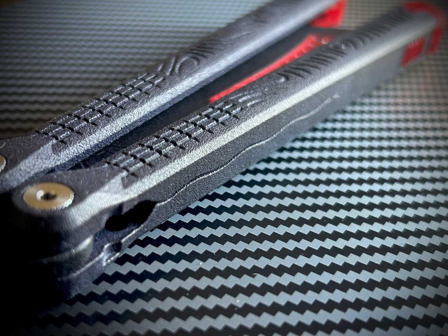 The Cycloid LC (Kershaw Lucha Compatible) is the most premium plastic butterfly knife trainer available. Whether you're looking for your first flipper, or are already experienced balisong flipper, the Cycloid LC's balance, grip, and durability will meet your needs perfectly. Made from glass-reinforced nylon, the Cycloid LC ranks among the heaviest and most durable plastic balisongs available. The Cycloid LC features channel-construction handles and clocks in at 2.7 oz.