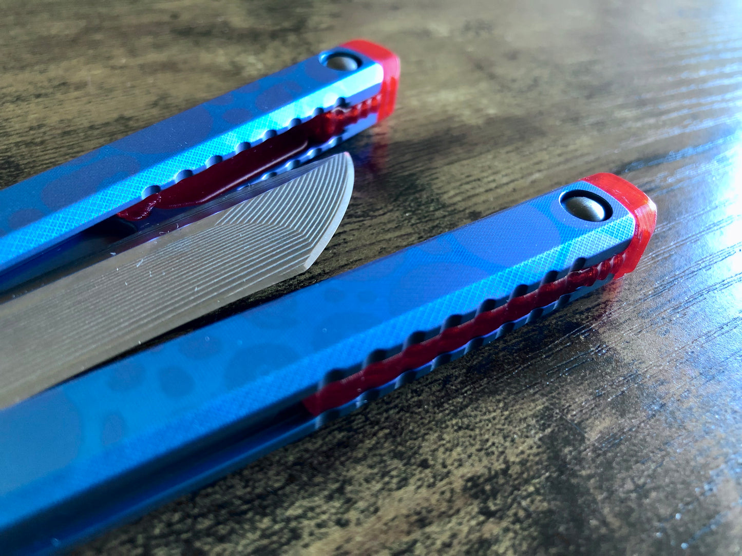 These Zippy spacers designed for the Fellowship Blades Gaboon balisong are made in-house from a rubbery, shatter-proof polyurethane. They add additional jimping to the Gaboon, and are also available as extensions which add handle length, protect the handles from drops, and include an adjustable tungsten weight system.