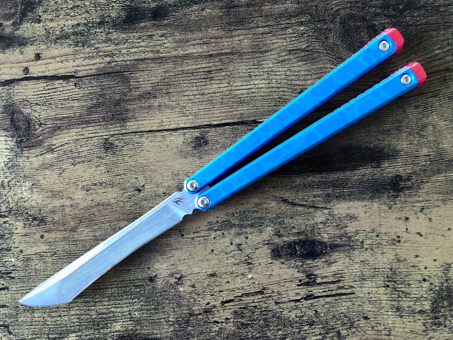 These Zippy spacers designed for the Fellowship Blades Gaboon balisong are made in-house from a rubbery, shatter-proof polyurethane. They add additional jimping to the Gaboon, and are also available as extensions which add handle length, protect the handles from drops, and include an adjustable tungsten weight system.