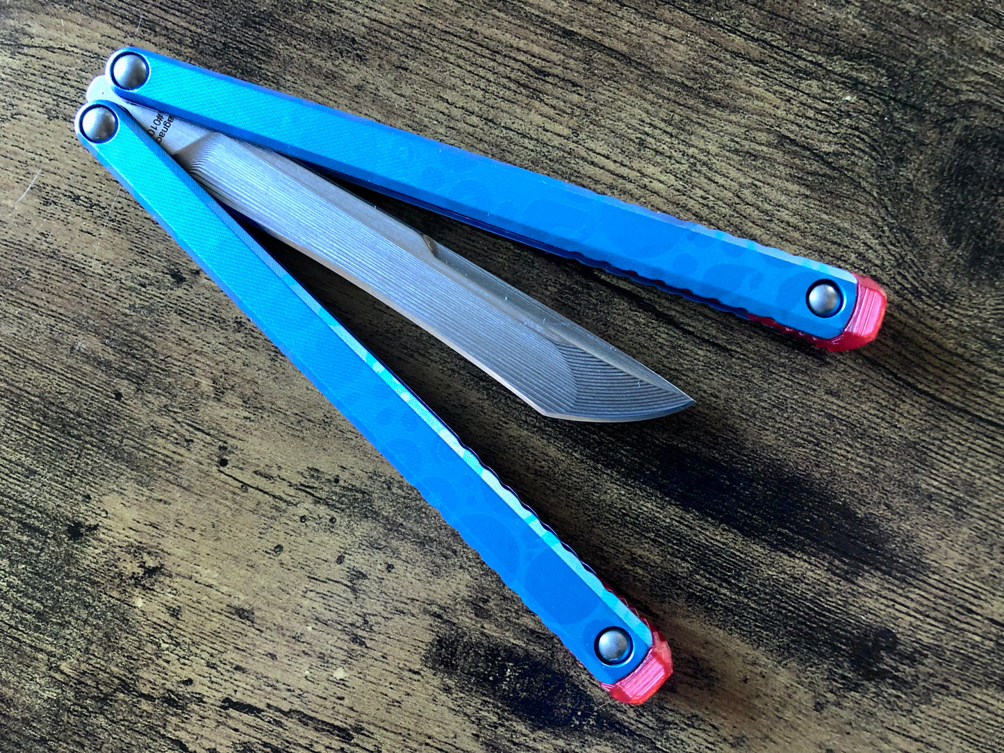 These Zippy spacers designed for the Fellowship Blades Gaboon balisong are made in-house from a rubbery, shatter-proof polyurethane. They add additional jimping to the Gaboon, and are also available as extensions which add handle length, protect the handles from drops, and include an adjustable tungsten weight system.