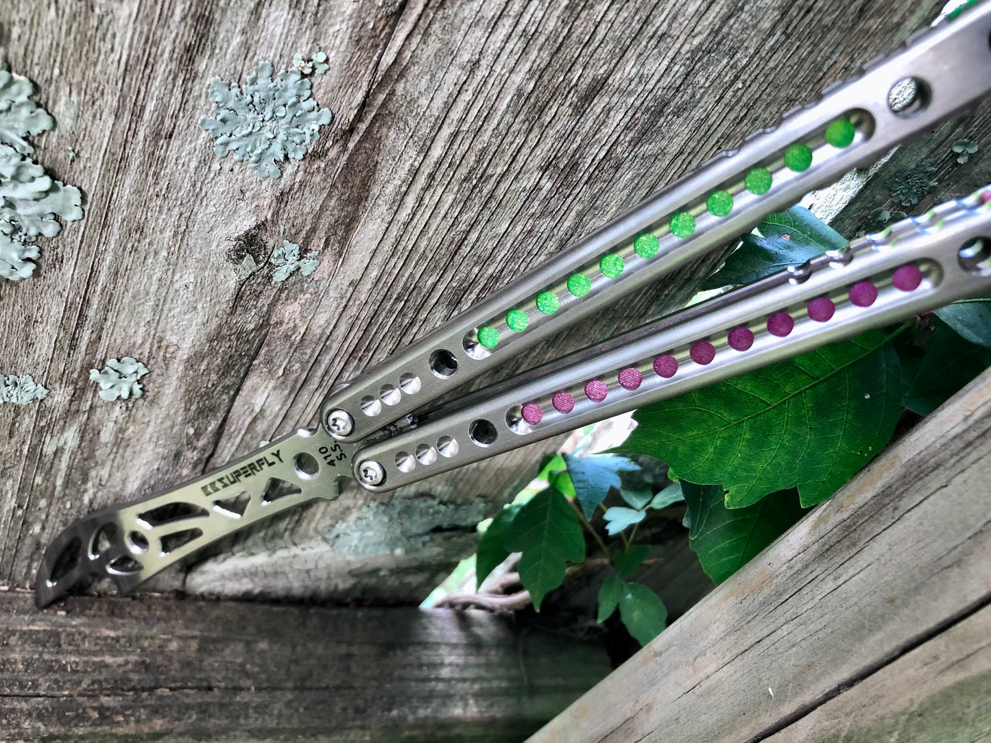 Add a pop of color to your BBbarfly SuperFly balisong trainer with these polyurethane Zippy handle inlays.