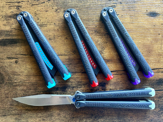The Cycloid LC (Kershaw Lucha Compatible) is the most premium plastic butterfly knife trainer available. Whether you're looking for your first flipper, or are already experienced balisong flipper, the Cycloid LC's balance, grip, and durability will meet your needs perfectly. Made from glass-reinforced nylon, the Cycloid LC ranks among the heaviest and most durable plastic balisongs available. The Cycloid LC features channel-construction handles and clocks in at 2.7 oz.
