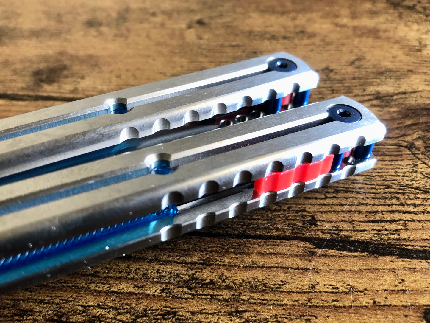 These Zippy spacers are designed for the Squid Industries Titanium Krake Raken and provide a "block spacer" aesthetic. The spacers feature an innovative "segmented" geometry, allowing full integration with the stock weight-pin system and endless balance and ergo configurations to fine-tune the weight distribution to your preference. The Zippy spacers also remedy the stock slab offset (i.e., spacer thickness) of the Ti Krake to establish improved handle parallelism for the best tune possible.