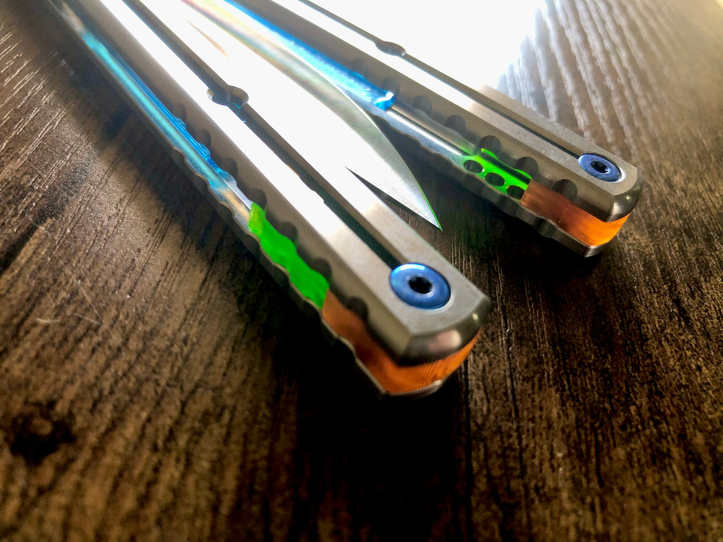 These Zippy spacers are designed for the Squid Industries Titanium Krake Raken and provide a "block spacer" aesthetic. The spacers feature an innovative "segmented" geometry, allowing full integration with the stock weight-pin system and endless balance and ergo configurations to fine-tune the weight distribution to your preference. The Zippy spacers also remedy the stock slab offset (i.e., spacer thickness) of the Ti Krake to establish improved handle parallelism for the best tune possible.
