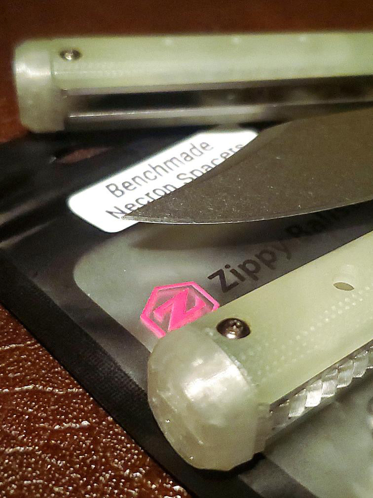 These Zippy spacers for the Benchmade Necron balisong are shatter-proof extensions that will protect your handles with no risk of cracking on hard-drops. They are available in 3x different lengths with removable tungsten weights for a more granular balance and length customization. They also offer positive jimping for extra grip, and install easily in just a few minutes (watch the assembly video above!). These spacers are a no-nonsense upgrade for the Necron.
