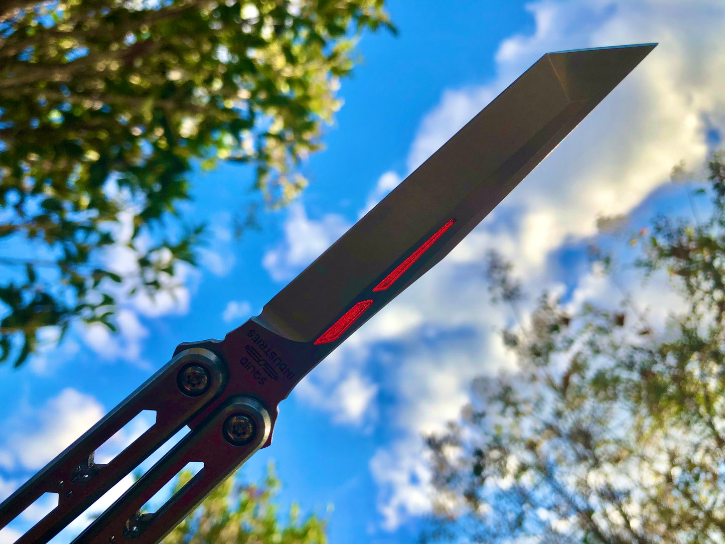 These Zippy spacers designed for the Squid Industries Hydro Balisong are made in-house from a rubbery, shatter-proof polyurethane. They add positive "sawtooth" jimping to the Hydro and are available as either full-length flush spacers for a more neutral balance, or handle extensions (with an adjustable tungsten weight system) to protect the handles from drops and increase momentum. A cosmetic blade insert is included.