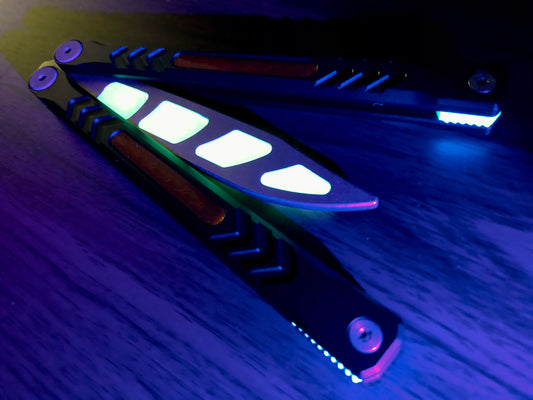 Modify the balance of your Revo Nexus balisong trainer with this custom-made Zippy balance mod. These inserts add blade weight for a more neutral balance profile. The inserts are made from a shatter-proof polyurethane and won't fall out on drops.