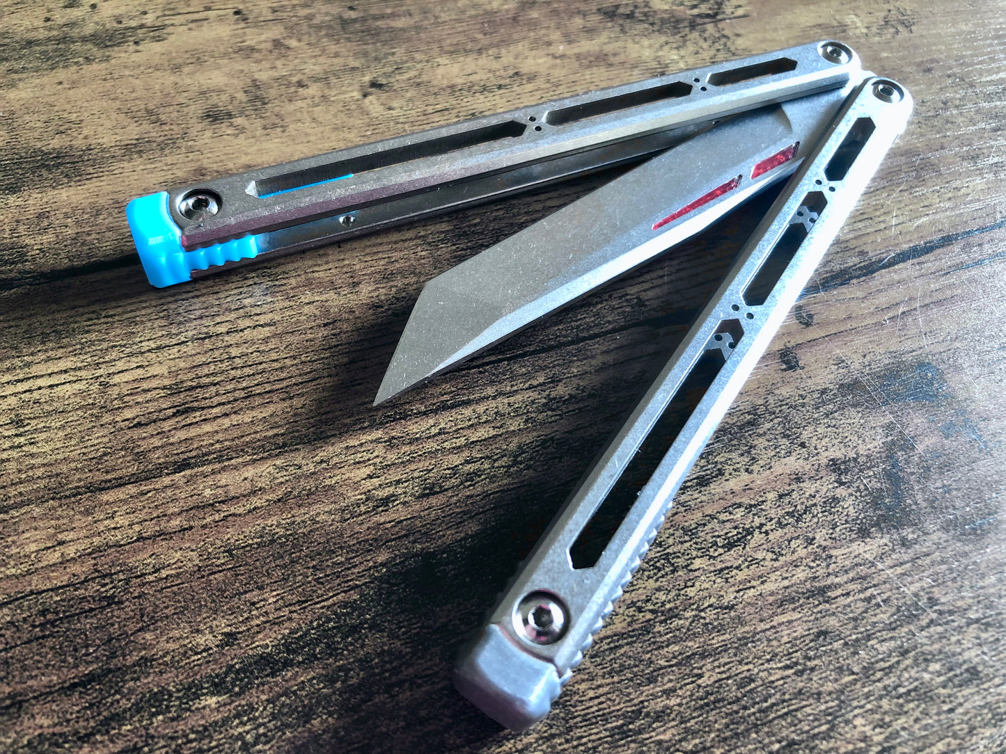 These Zippy spacers designed for the Squid Industries Hydro Balisong are made in-house from a rubbery, shatter-proof polyurethane. They add positive "sawtooth" jimping to the Hydro and are available as either full-length flush spacers for a more neutral balance, or handle extensions (with an adjustable tungsten weight system) to protect the handles from drops and increase momentum. A cosmetic blade insert is included.