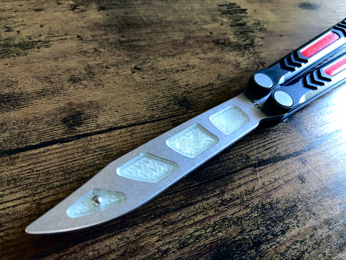 Modify the balance of your Revo Nexus balisong trainer with this custom-made Zippy balance mod. These inserts add blade weight for a more neutral balance profile. The inserts are made from a shatter-proof polyurethane and won't fall out on drops.