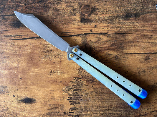 These Zippy spacers for the Benchmade Necron balisong are shatter-proof extensions that will protect your handles with no risk of cracking on hard-drops. They are available in 3x different lengths with removable tungsten weights for a more granular balance and length customization. They also offer positive jimping for extra grip, and install easily in just a few minutes (watch the assembly video above!). These spacers are a no-nonsense upgrade for the Necron.