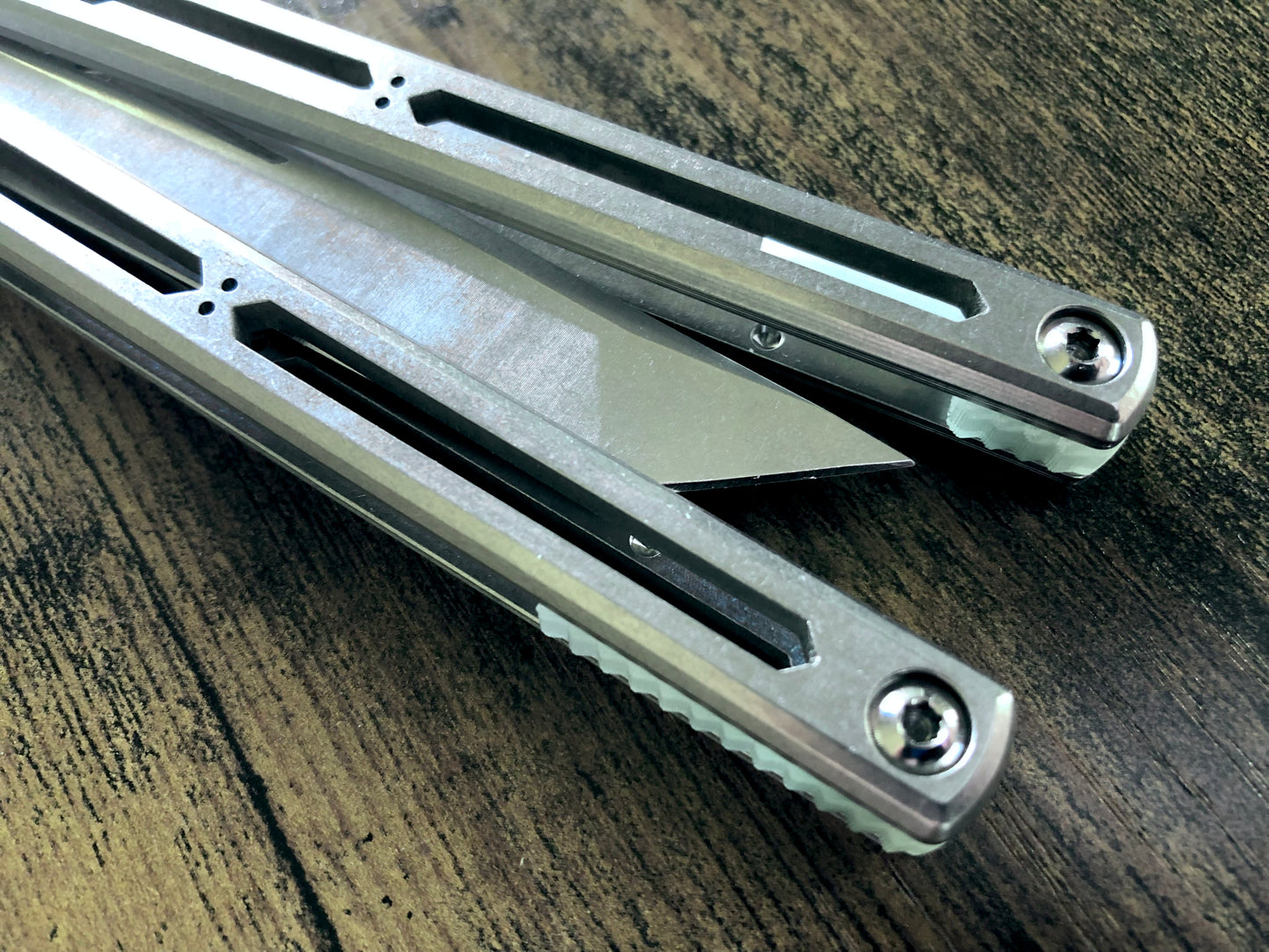 These Zippy spacers designed for the Squid Industries Hydro Balisong are made in-house from a rubbery, shatter-proof polyurethane. They add positive "sawtooth" jimping to the Hydro and are available as either full-length flush spacers for a more neutral balance, or handle extensions (with an adjustable tungsten weight system) to protect the handles from drops and increase momentum. A cosmetic blade insert is included.