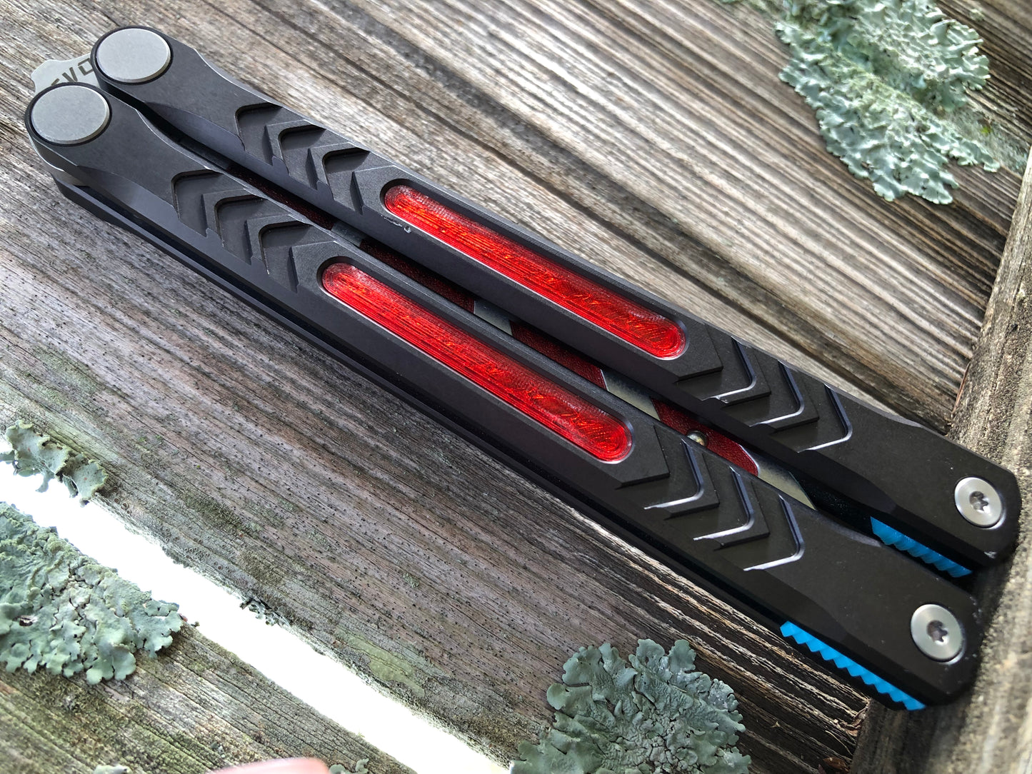 Reduce the handle bias and add grip to your Revo Nexus balisong with Zippy handle inlays and lightweight spacers featuring positive jimping.