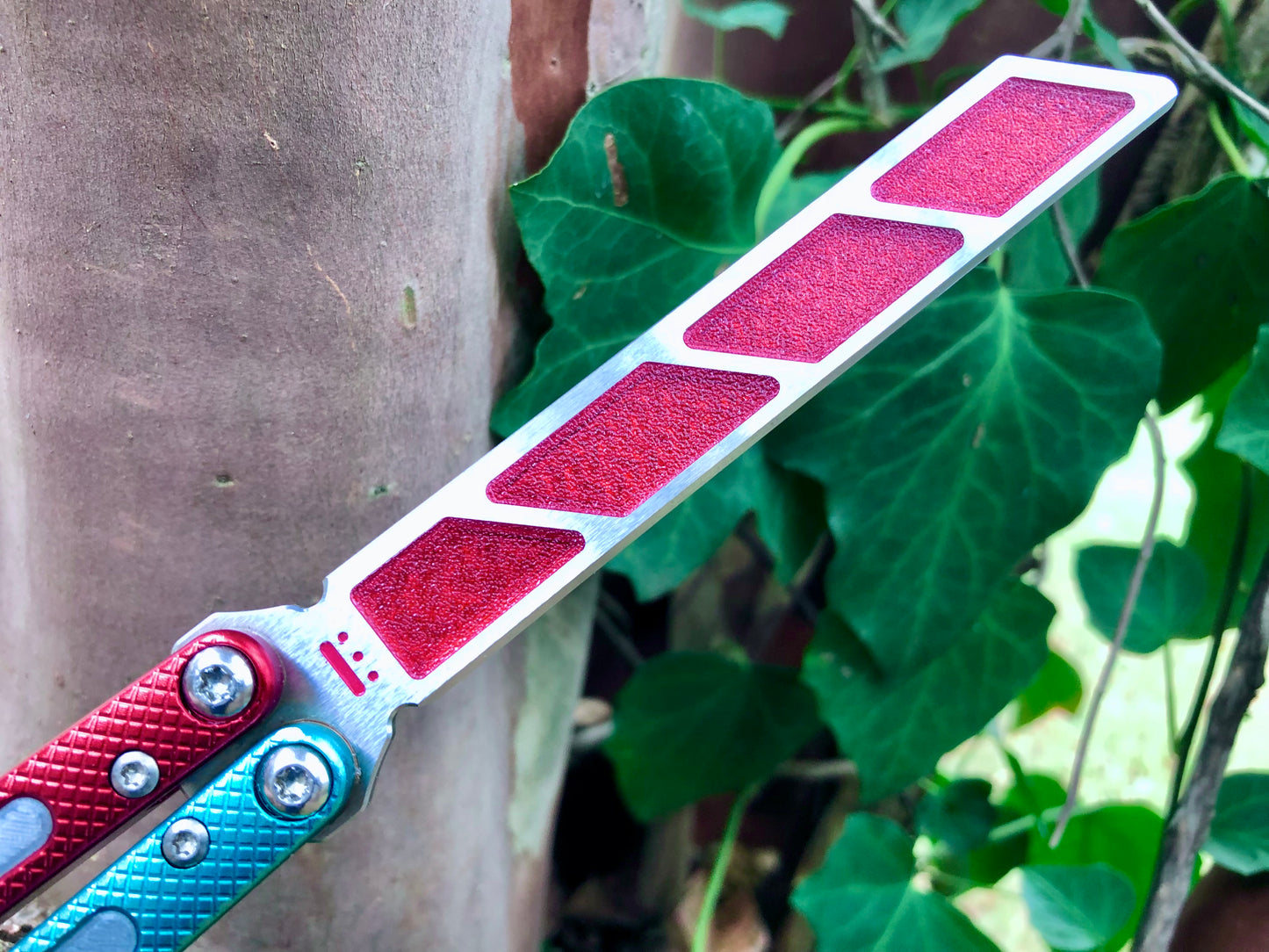 Add blade weight and a pop of color to your NRB Ultralight balisong trainer with these custom-made Zippy blade inserts. The inserts are made of a shatter-proof polyurethane with an edge lip, so they won't fall out on drops. The inserts enable you to modify the balance of your Ultralight and can be used to compensate for the added handle weight from the Zippy handle inlays.