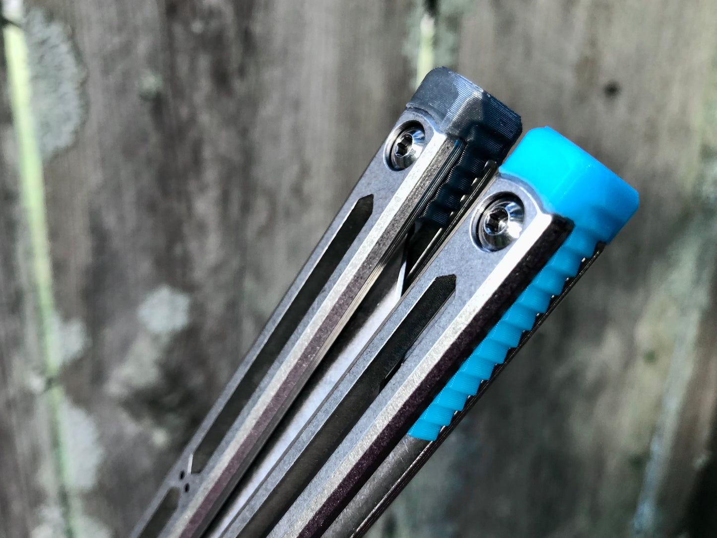 These Zippy spacers designed for the Squid Industries Hydro Balisong are made in-house from a rubbery, shatter-proof polyurethane. They add positive "sawtooth" jimping to the Hydro and are available as either full-length flush spacers for a more neutral balance, or handle extensions (with an adjustable tungsten weight system) to protect the handles from drops and increase momentum. A cosmetic blade insert is included.