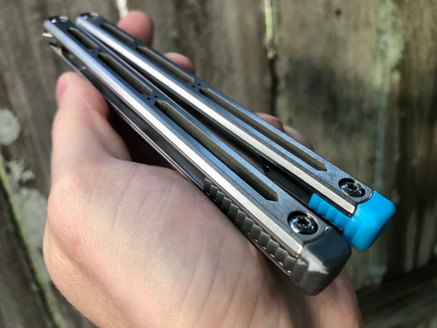 These Zippy spacers designed for the Squid Industries Hydro Balisong are made in-house from a rubbery, shatter-proof polyurethane. They add positive "sawtooth" jimping to the Hydro and are available as either full-length flush spacers for a more neutral balance, or handle extensions (with an adjustable tungsten weight system) to protect the handles from drops and increase momentum. A cosmetic blade insert is included.