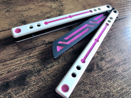 Modify the balance and add a pop of color to your Squid industries balisong trainer with these polyurethane blade inserts and handle inlays. The objective of this mod is to add blade weight for a slightly more neutral balance, with optional cosmetic handle inlays to add a pop of color.