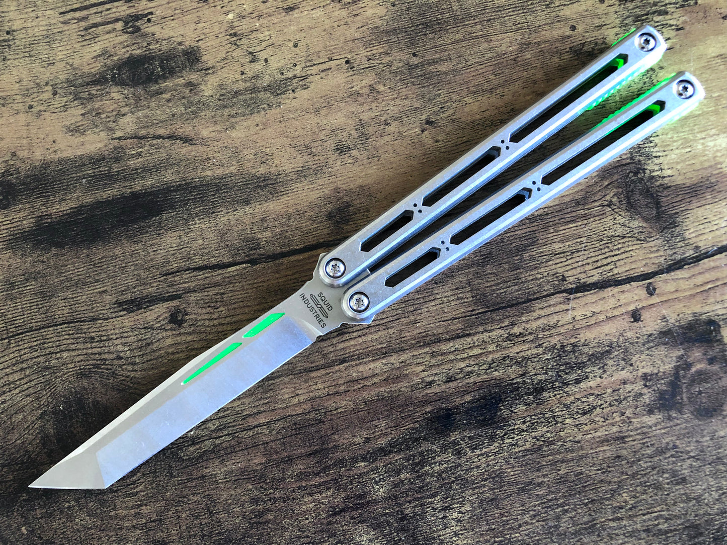 These Zippy spacers designed for the Squid Industries Hydro Balisong are made in-house from a rubbery, shatter-proof polyurethane. They add positive "sawtooth" jimping to the Hydro and are available as either full-length flush spacers for a more neutral balance, or handle extensions (with an adjustable tungsten weight system) to protect the handles from drops and increase momentum. A cosmetic blade insert is included.