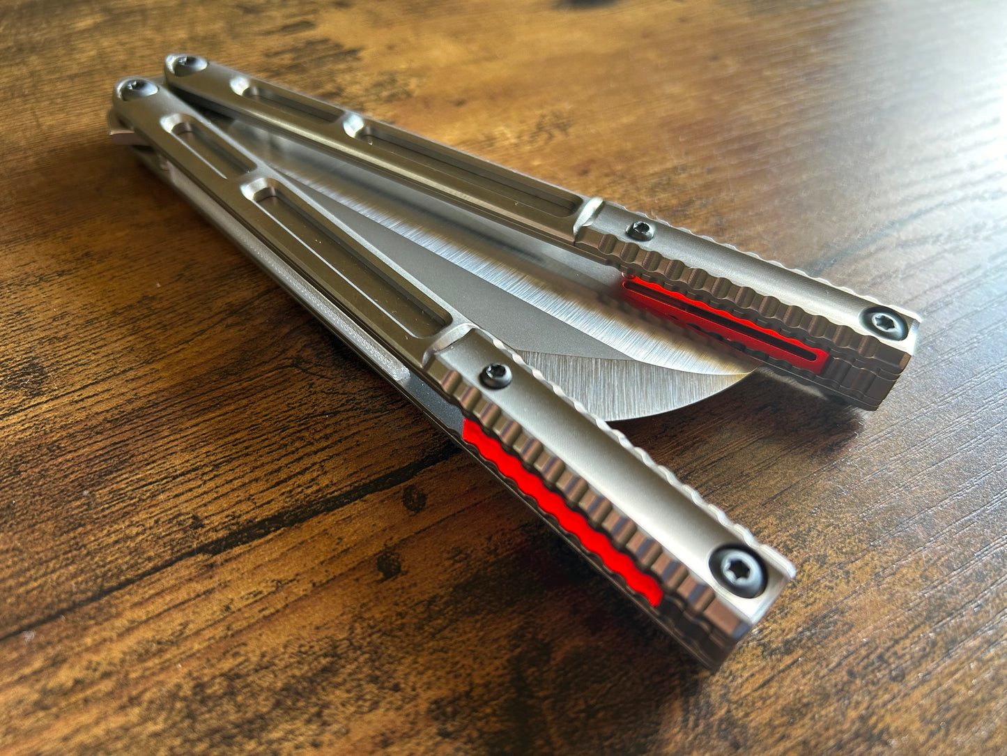 These ultra-lightweight Zippy speed channel inserts are custom-designed for the Andrew Myers Knife Works (AMKW) Aeon butterfly knife They add positive jimping to the Aeon for extra grip, deepen the sound, and dampen the ring.