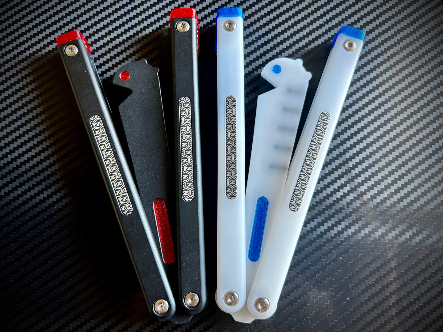 The Frank-Z is a plastic balisong trainer collaboration brought to you by none other than LDY and Zippy. Now, you can get the LDY Frank butterfly knife trainer with cosmetic Zippy blade inserts and Zippy extensions for longer handle length and improved durability. Plus, you can reduce the volume with optional Zippy silencers.
