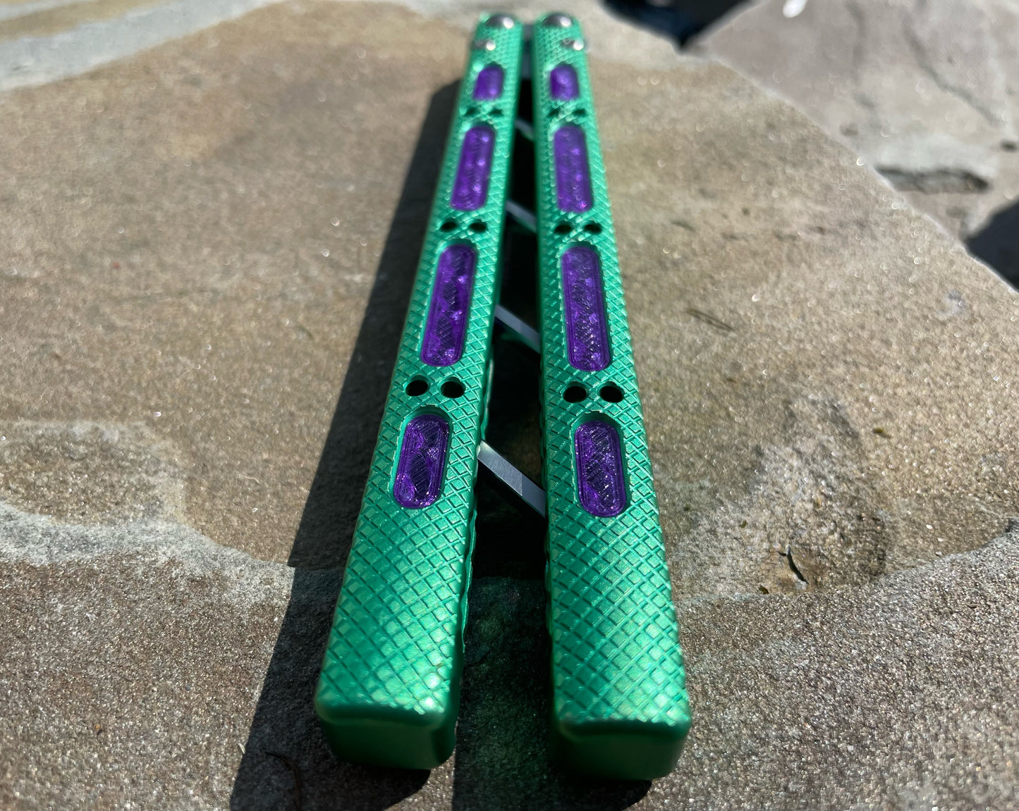 Modify the grip of your NRB Concepts SLight balisong and NRB UltraLight balisong trainer with Zippy handle inlays.