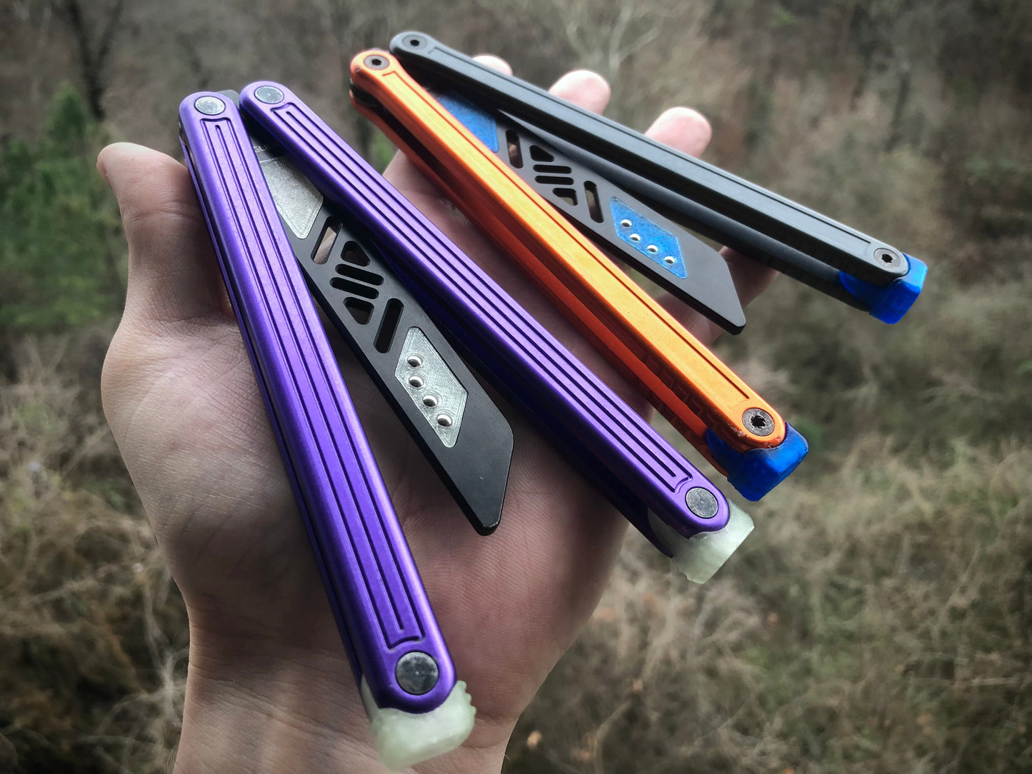Reduce the handle bias and adjust the balance of your Glidr Arctic, Antarctic, and Bermuda balisong trainers with tungsten-weighted Zippy blade inserts and spacers featuring adjustable balance and positive jimping.