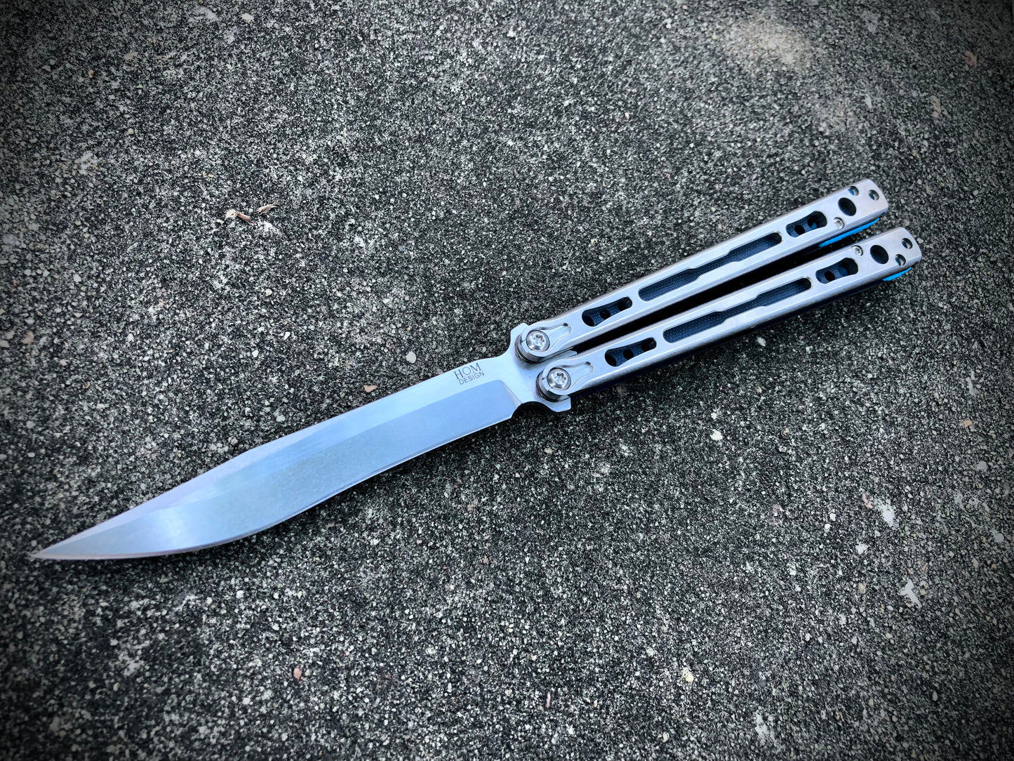 Make your HOM Chimera balisong a more neutral flipper with Zippy spacers: full-length spacers with jimping, or spring-latch spacers that counterweight the safe handle for improved balance.