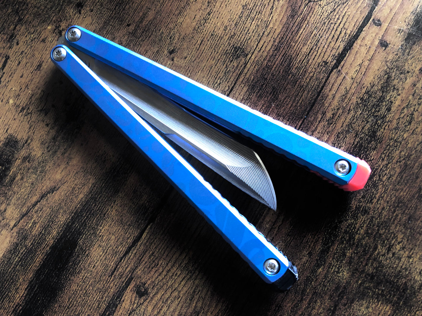 These Zippy spacers designed for the Fellowship Blades Gaboon balisong are made in-house from a rubbery, shatter-proof polyurethane. They add additional jimping to the Gaboon, and are also available as extensions which add handle length, protect the handles from drops, and include an adjustable tungsten weight system.