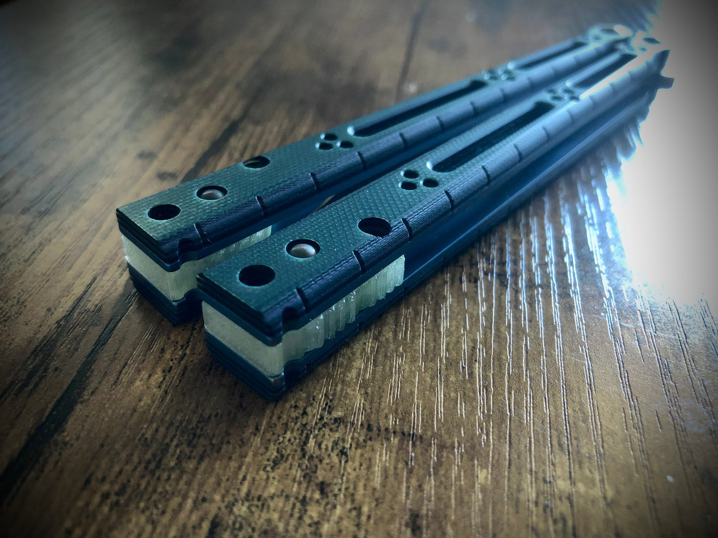 Reduce the handle bias of your HOM i-Basilisk, HOM Basilisk-R (for Titanium and G10/CF variants), and HOM Prodigy balisongs with Zippy extension spacers and handle inlays.