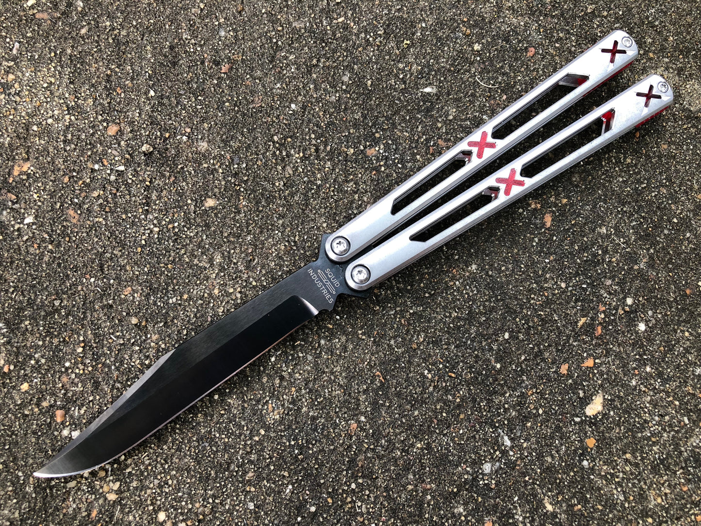 Made by Bxndxge Knives (Bandage, not bondage!) in collaboration with Zippy, the "Stitch" handles are a Titanium rehandle mod compatible with blades from both the BRS Replicant and Squid Industries Krake Raken balisongs.