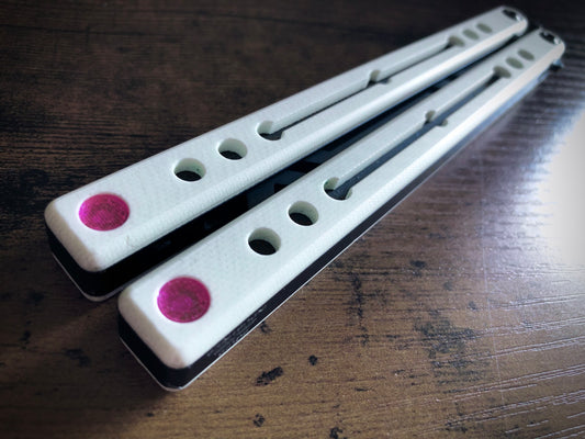 Reduce the handle bias of your Squid industries Swordfish, Nautilus, and Madko balisong trainers with this Zippy balance mod. Replace the metal sexbolts at the base of the handles with featherweight, shatter-proof polyurethane sexbolts.