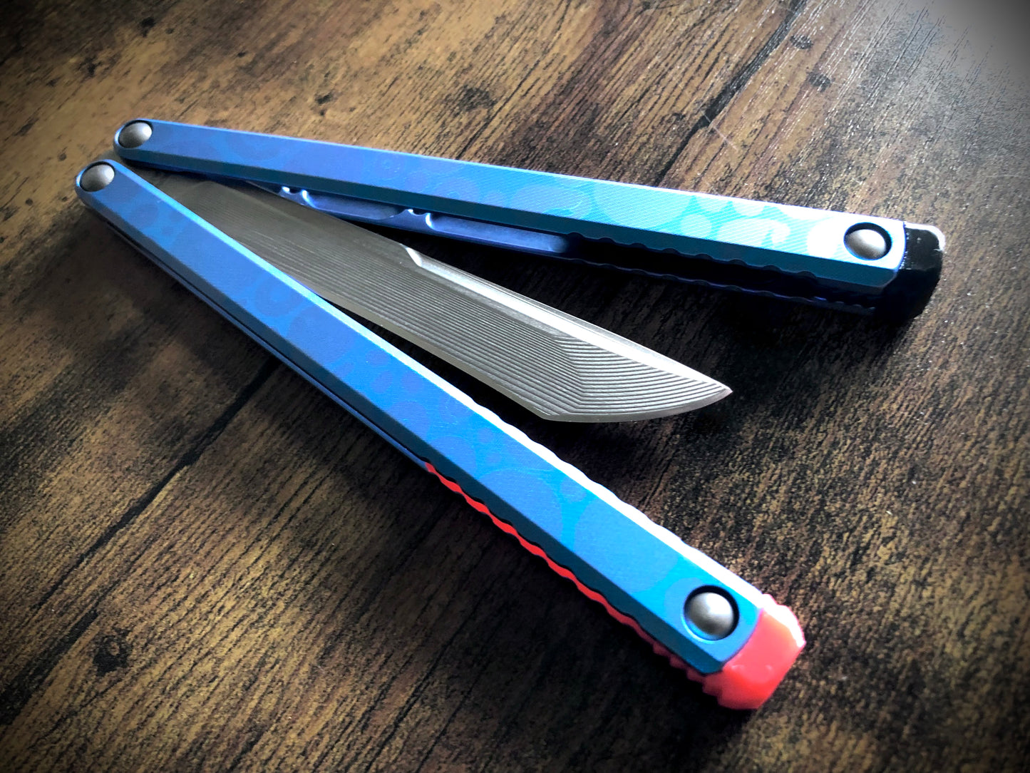 These Zippy spacers designed for the Fellowship Blades Gaboon balisong are made in-house from a rubbery, shatter-proof polyurethane. They add additional jimping to the Gaboon, and are also available as extensions which add handle length, protect the handles from drops, and include an adjustable tungsten weight system.