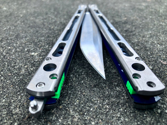 Make your HOM Chimera balisong a more neutral flipper with Zippy spacers: full-length spacers with jimping, or spring-latch spacers that counterweight the safe handle for improved balance.