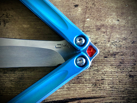 Add a pop of color to your JK Design Embargo balisong with these Zippy tang inserts. The inserts are made in-house from a rubbery polyurethane and won't pop out on drops.