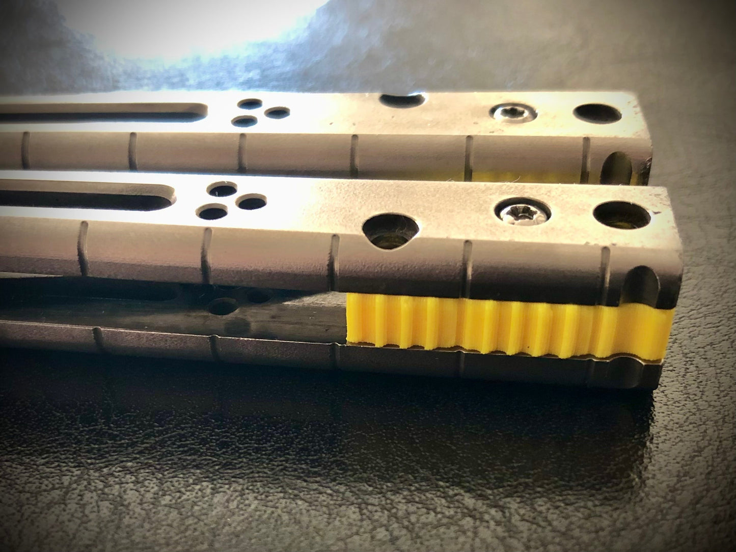 Reduce the handle bias of your HOM i-Basilisk, HOM Basilisk-R (for Titanium and G10/CF variants), and HOM Prodigy balisongs with Zippy extension spacers and handle inlays.