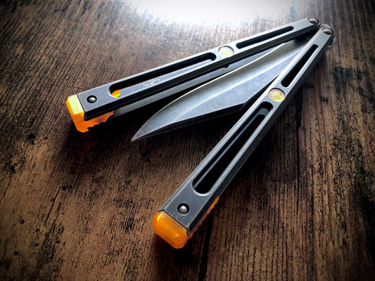 Extend and protect your handles with these Zippy spacers, custom-made for the Goose balisong (designed by Arthur Goins and machined by JK Design). The spacers are made from a shatter-proof polyurethane and protect your handles from drops while adding length. The spacers also feature positive sawtooth jimping and adjustable balance.