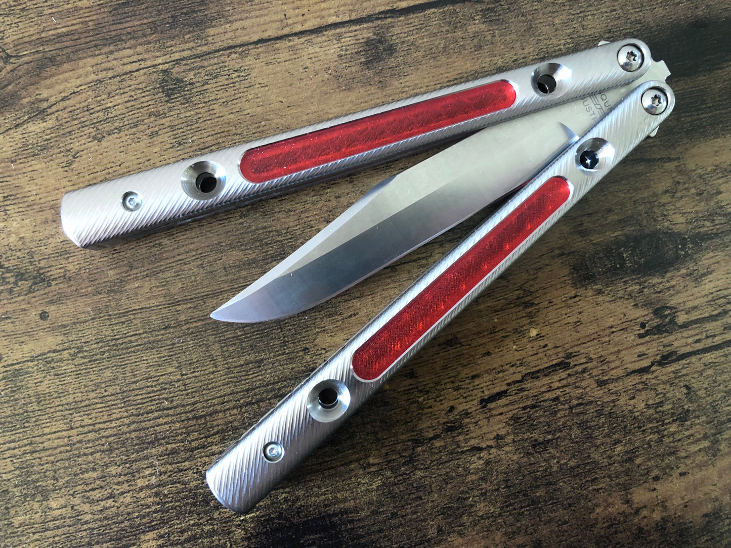 Add grip, comfort, and eliminate ring with these Zippy polyurethane handle inlays designed to fit the titanium Squiggle handles for the Squid Industries Krake Raken balisong.